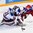 HELSINKI, FINLAND - JANUARY 4: Russia's Andrei Kuzmenko #21 collides with USA's Louis Belpedio #8 and Alex Nedeljkovic #31 during semifinal round action at the 2016 IIHF World Junior Championship. (Photo by Matt Zambonin/HHOF-IIHF Images)

